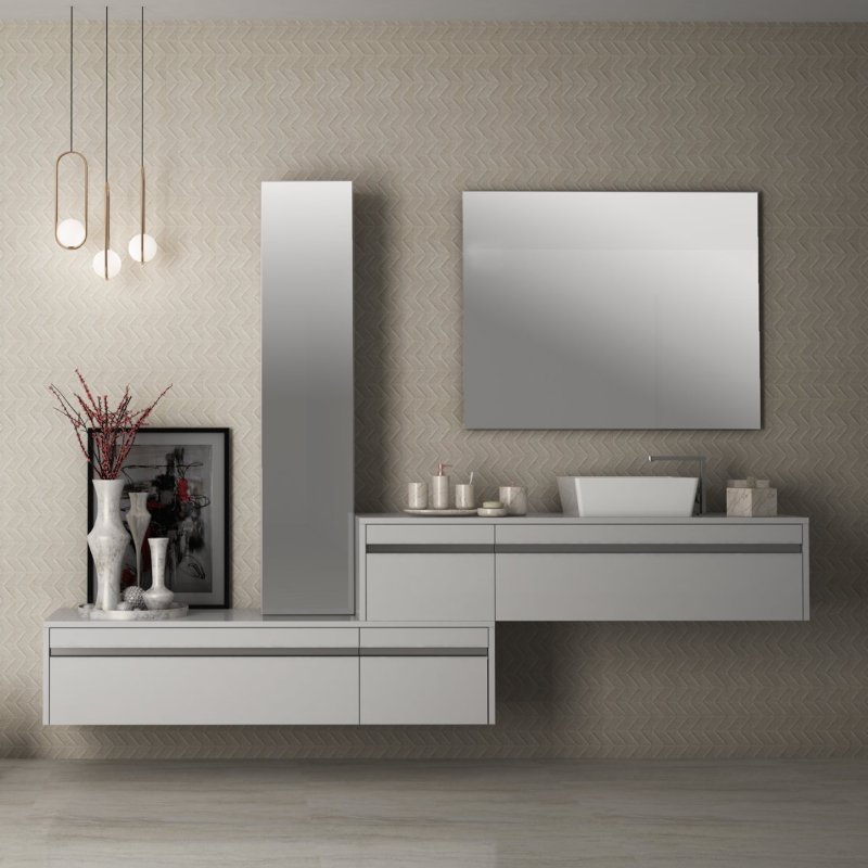 Vista frontal de pared con mueble de baño sobre ella en tonos claros con lavabo integrado, espejo rectangular sobre pared y otro vertical