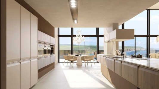 Cocina en tonos cálidos modelo Gravedad de Senssia Cocina en tonos cálidos muy iluminada con electrodomésticos integrados e isla de cocina central con fregadero y vitrocerámica integrados